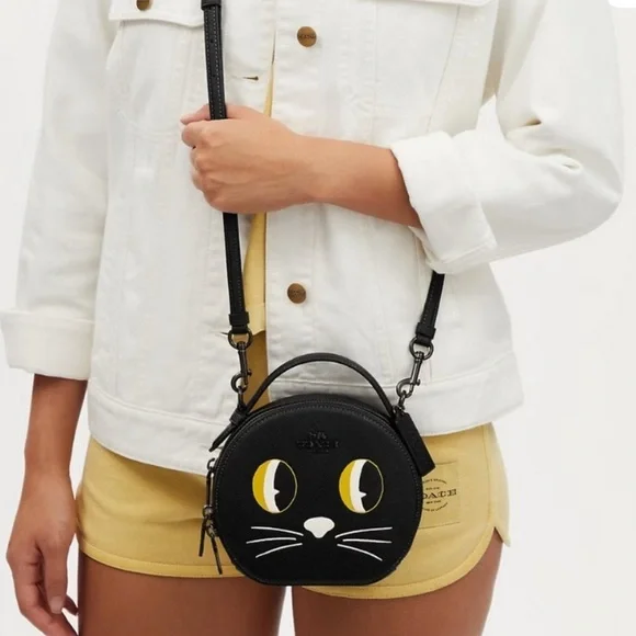 Coach Black Leather Cat Motif Round Crossbody with Yellow Eye Accents - Picture 2 of 11